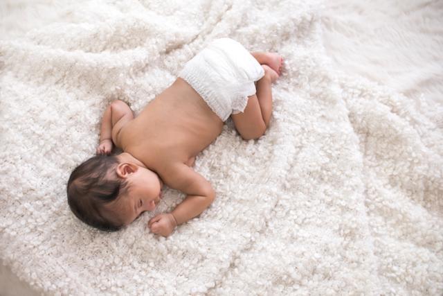 Baby boy possibly suffocated after sleeping belly down